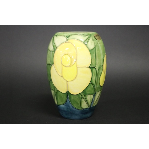 Moorcroft pottery green ground vase,