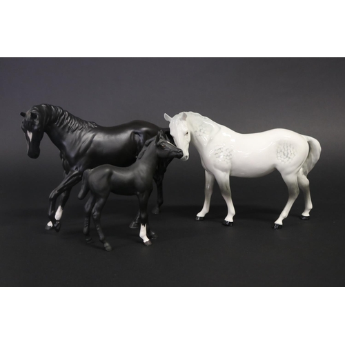 Three medium sized Beswick horses,