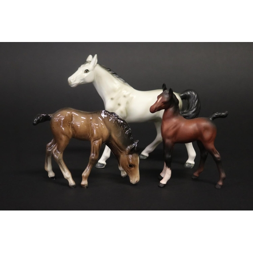 Three small Beswick horse figures,