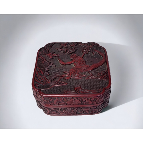 A DEEPLY CARVED CHINESE CINNABAR