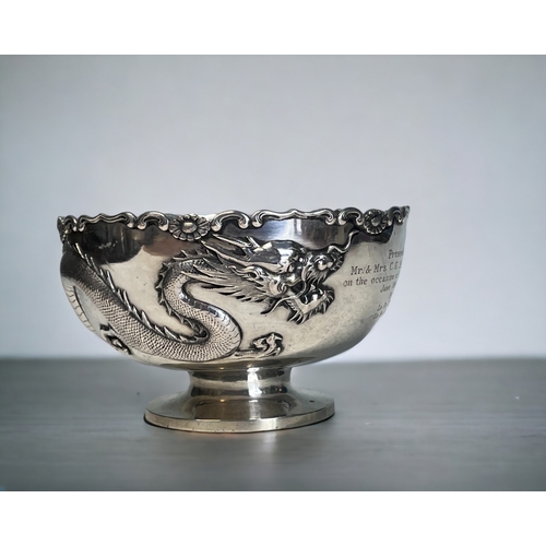 A CHINESE SILVER DRAGON BOWL.Early