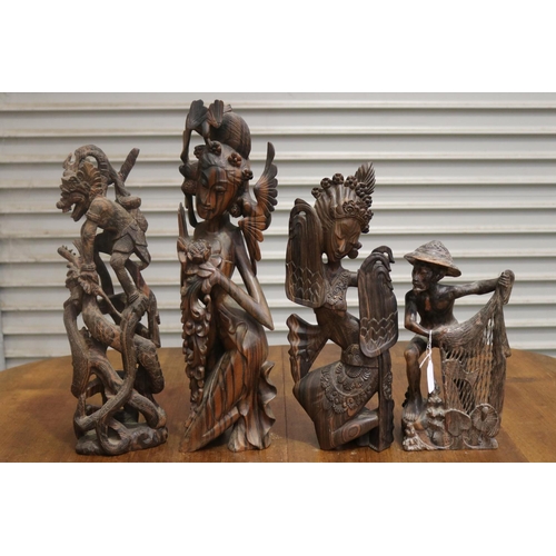 Four carved hardwood South East