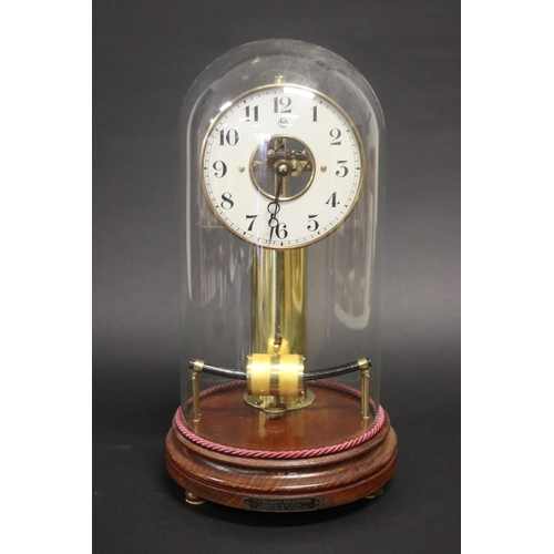 French clock under dome with plaque