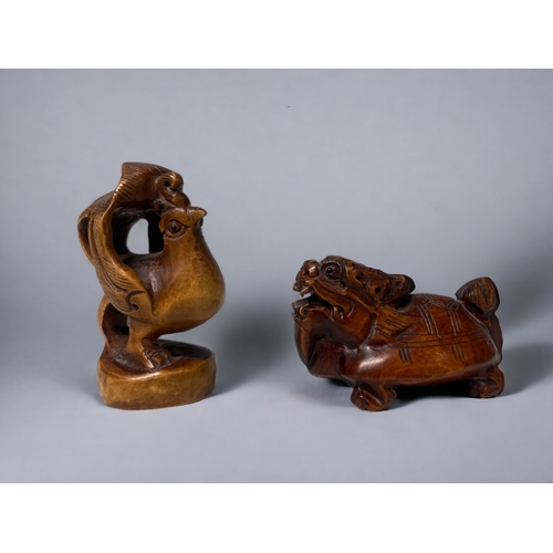Two carved Japanese Netsukes.20th century.One