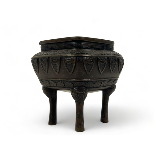 A Chinese bronze censer.Qing dynasty.raised