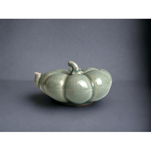 A Chinese celadon porcelain water