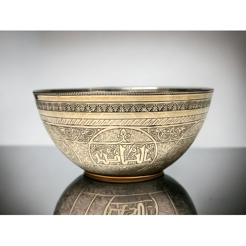 A Burmese white metal finger bowl.Engraved