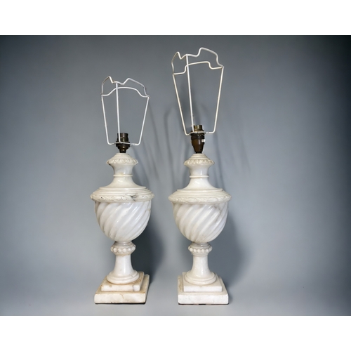 A pair of vintage Italian carved