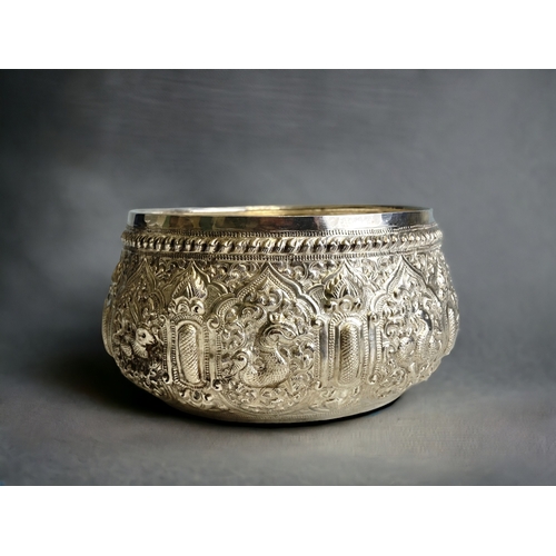 A Burmese Silver 'Thabeik' bowl.Ornately