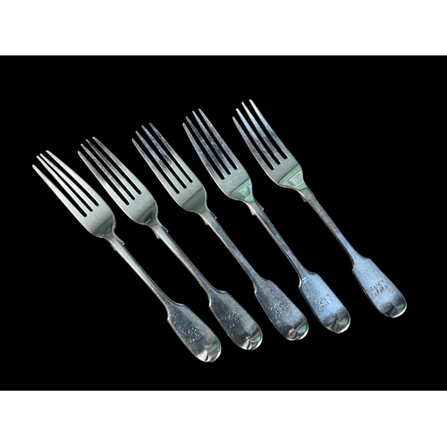 A set of five sterling silver dinner