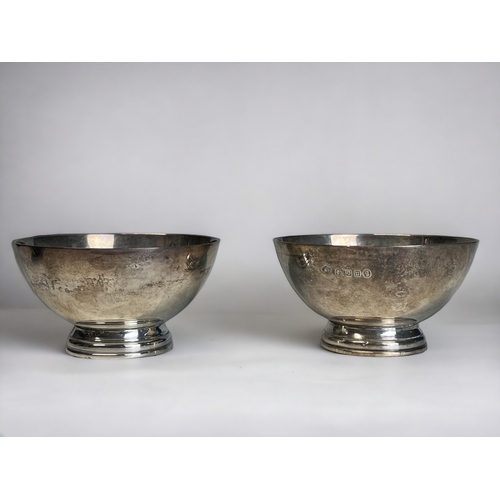 A PAIR OF STERLING SILVER FOOTED