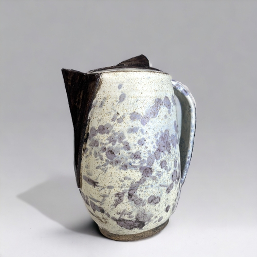 AN UNUSUAL STUDIO POTTERY JUG &