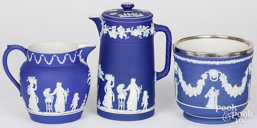 TWO WEDGWOOD BLUE JASPERWARE PITCHERS,