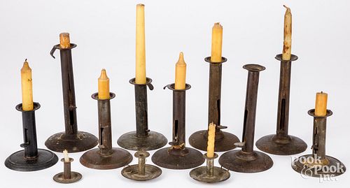 GROUP OF HOG SCRAPER CANDLESTICKS,