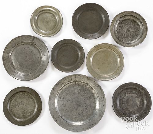 NINE PEWTER PLATES AND CHARGERS,