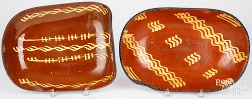 TWO PENNSYLVANIA REDWARE LOAF DISHES,