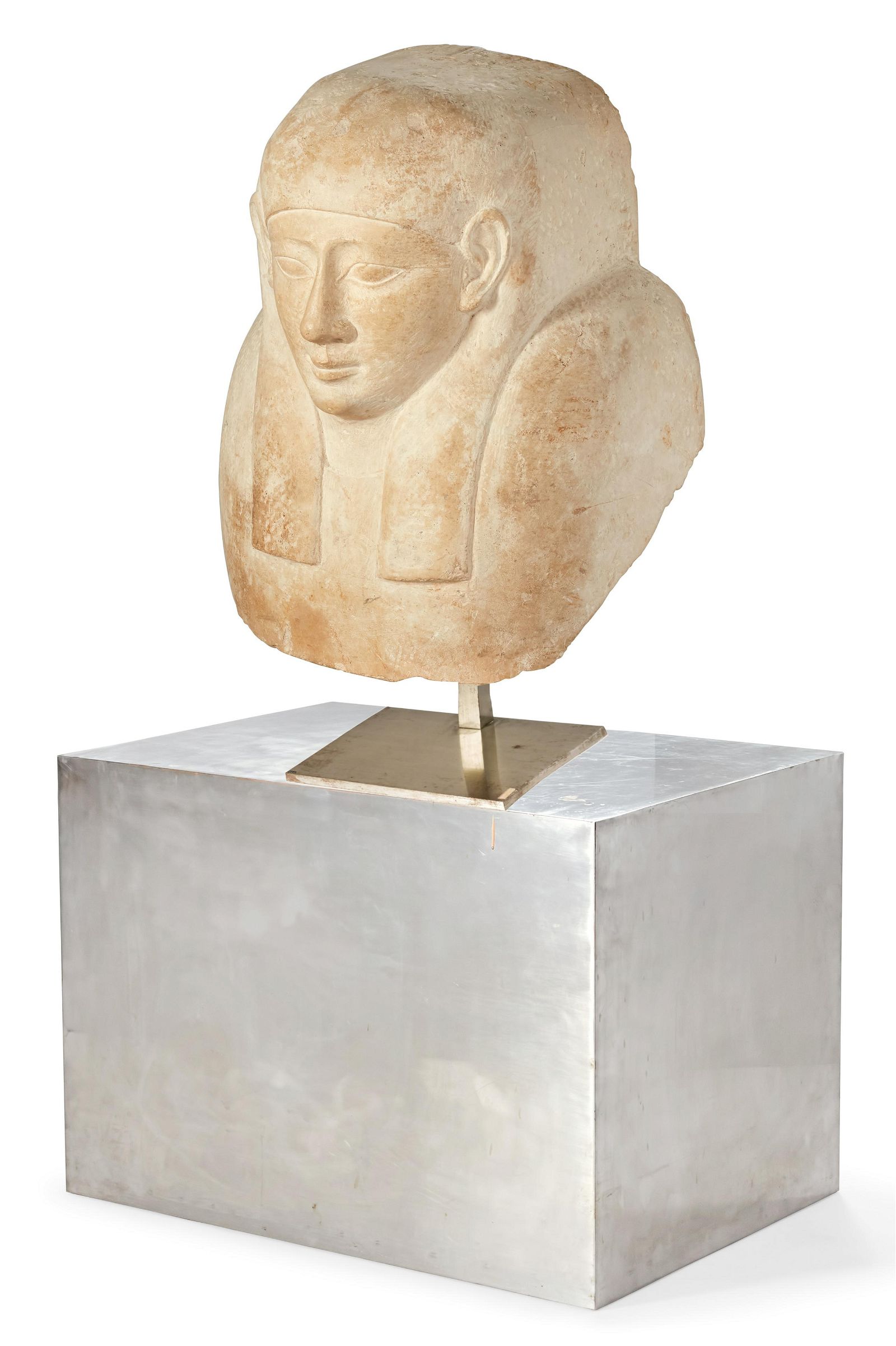 A LIMESTONE PORTRAIT BUST OF AN