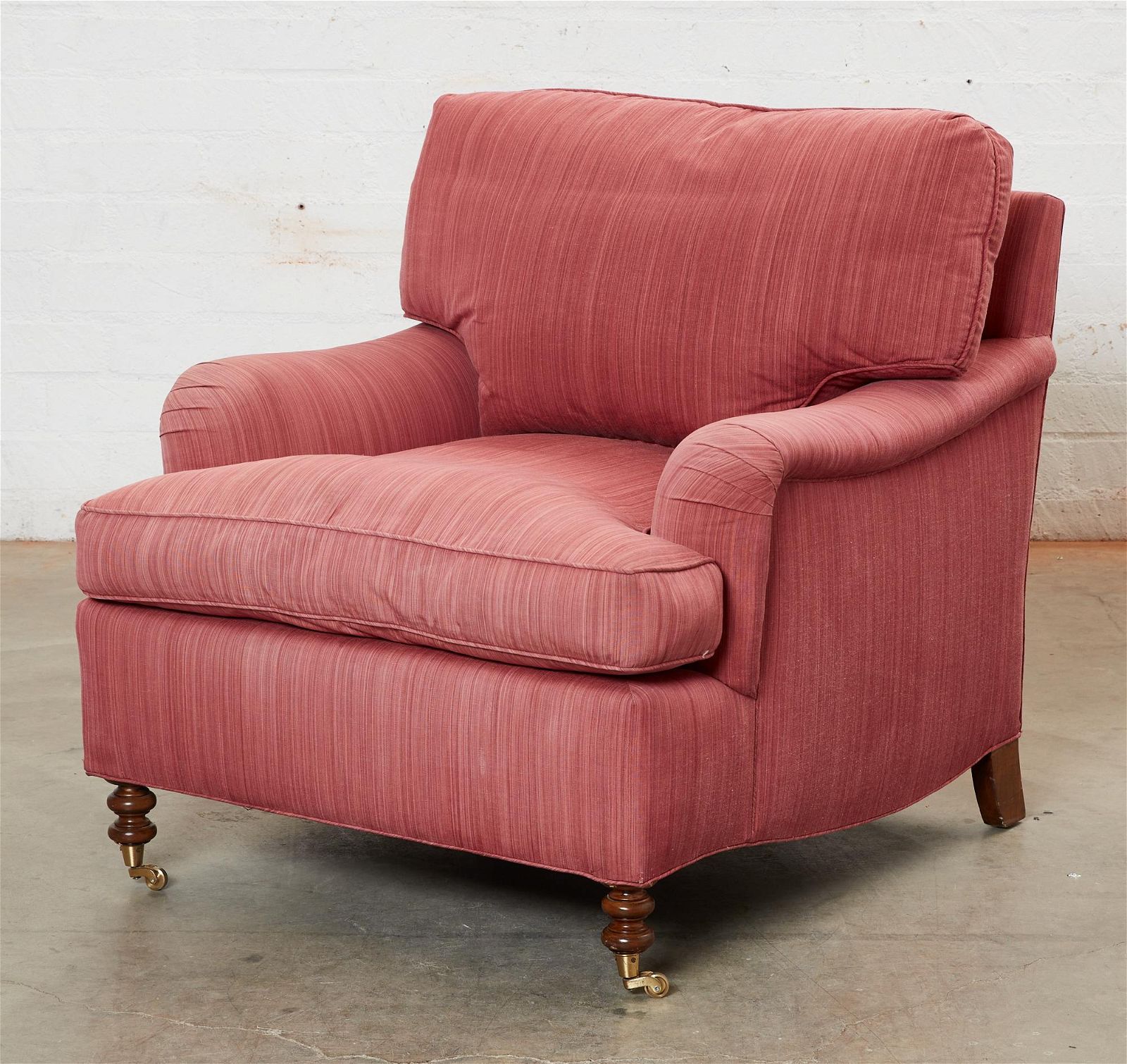 A PINK SATIN UPHOLSTERED CLUB ARMCHAIRA