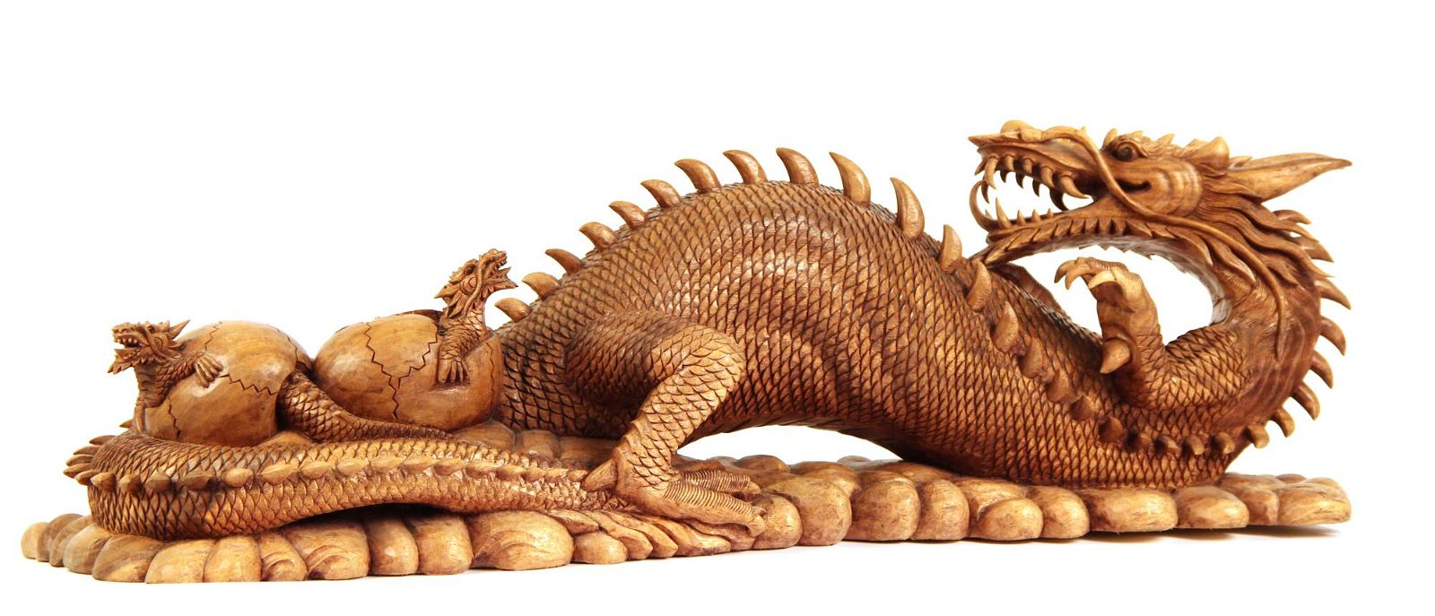 A LARGE ASIAN WOOD MODEL OF A DRAGONA