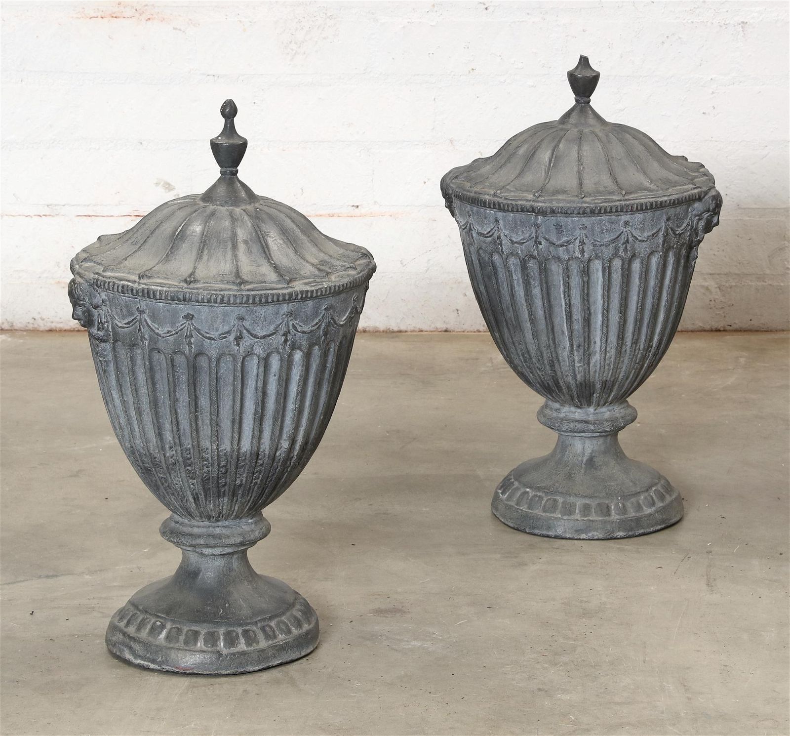 A PAIR OF NEOCLASSICAL STYLE LEAD