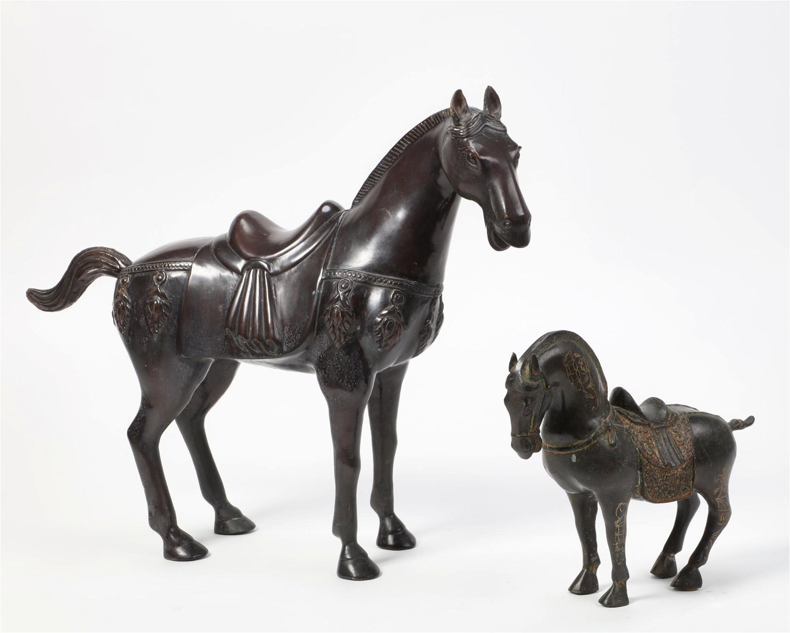 TWO CHINESE BRONZE MODELS OF HORSESTwo