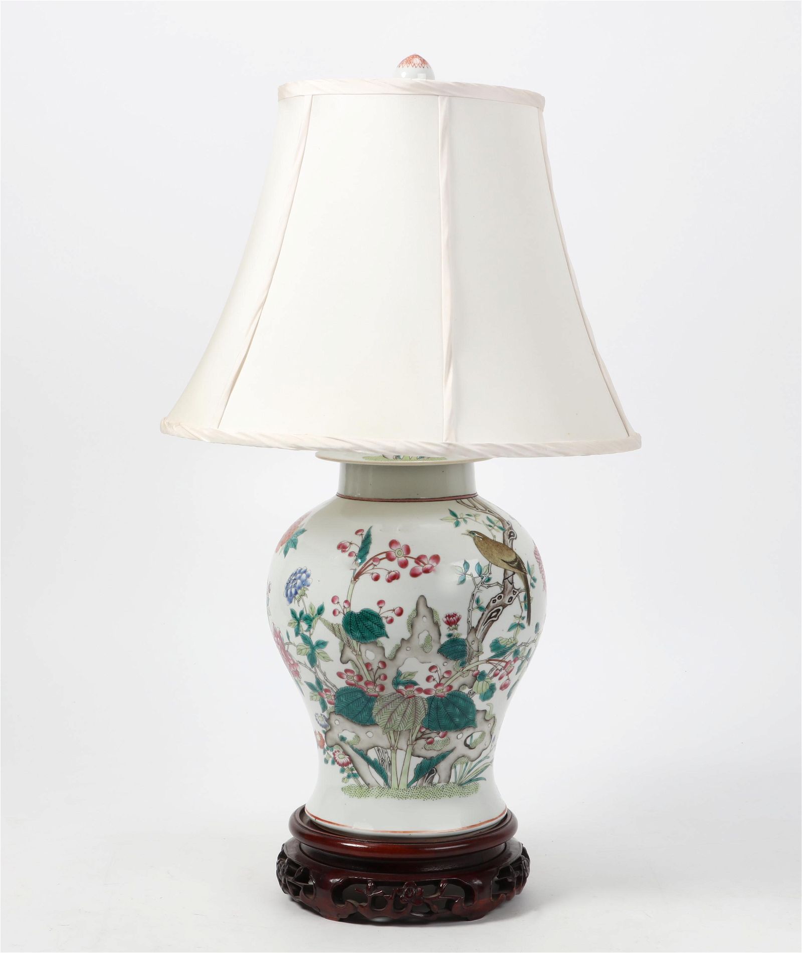 A CHINESE GINGER JAR WITH FLORA