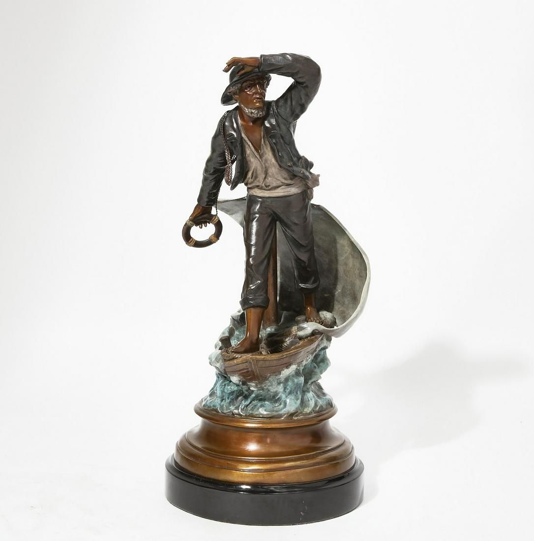 A PATINATED BRONZE MODEL OF A MARINER