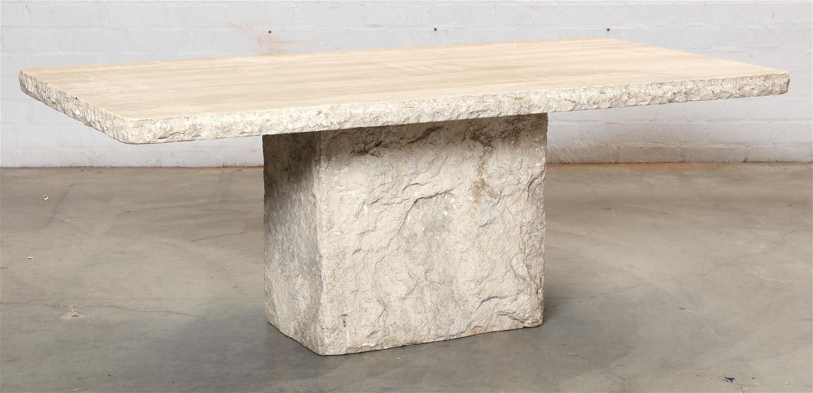 A RUSTIC CAST STONE DINING TABLE,