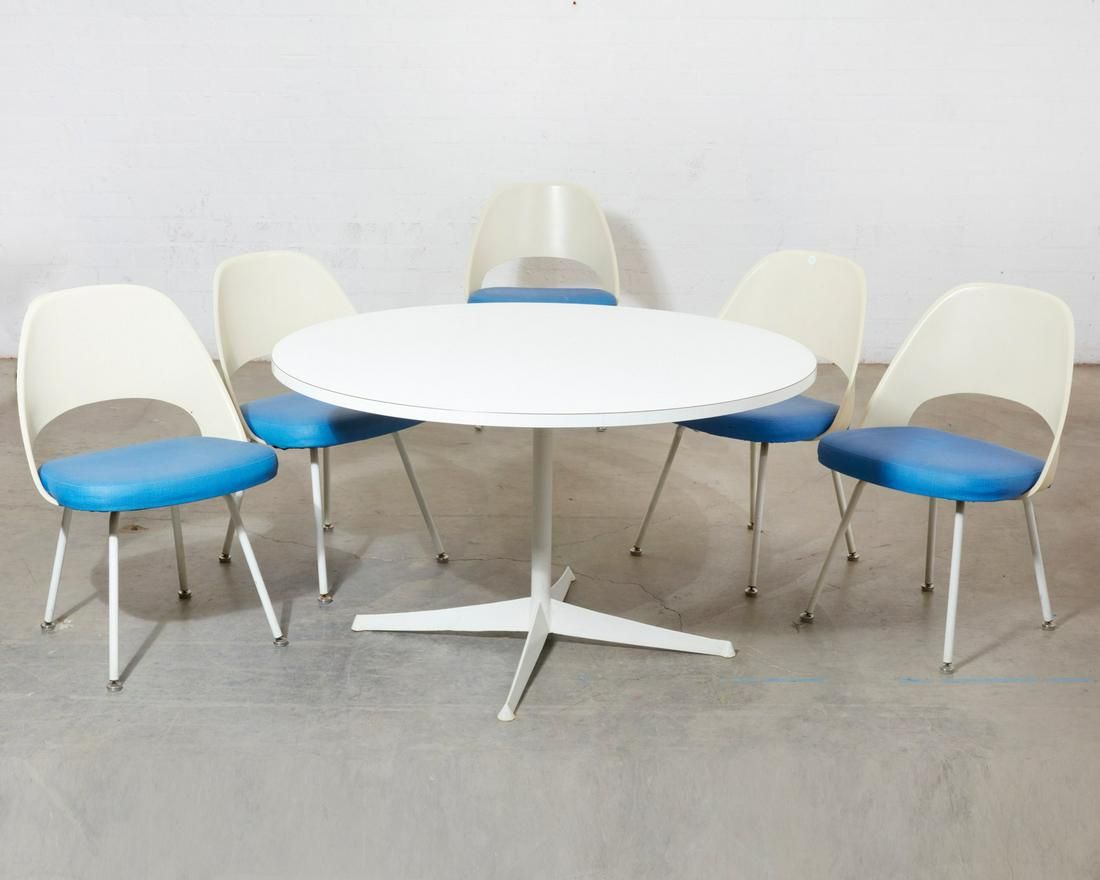 A KNOLL CIRCULAR DINING TABLE AND