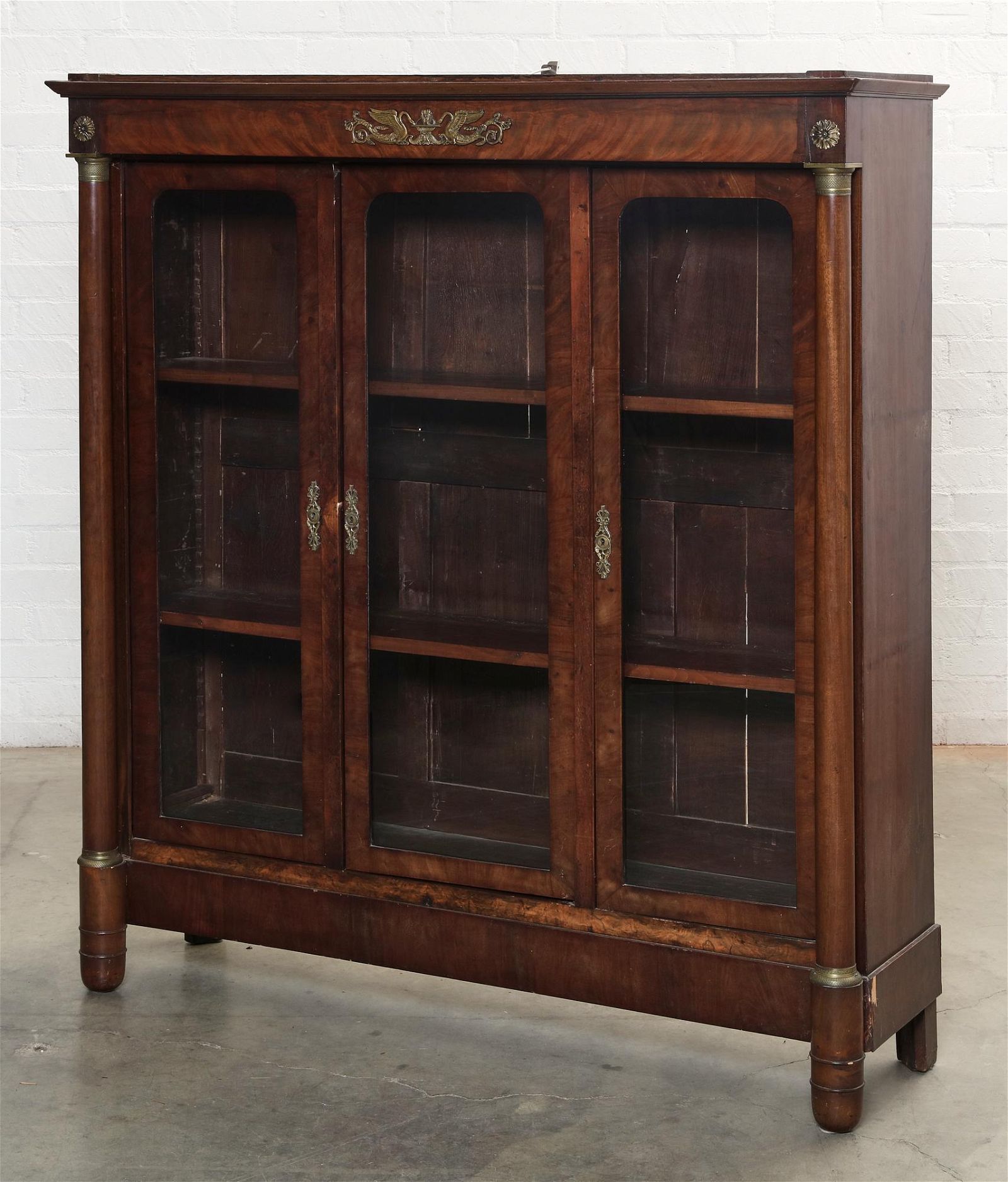 AN EMPIRE MAHOGANY BIBLIOTHEQUEAn