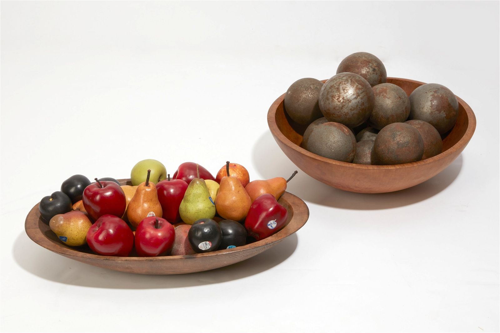 TWO FRUITWOOD BOWLS WITH SPHERES