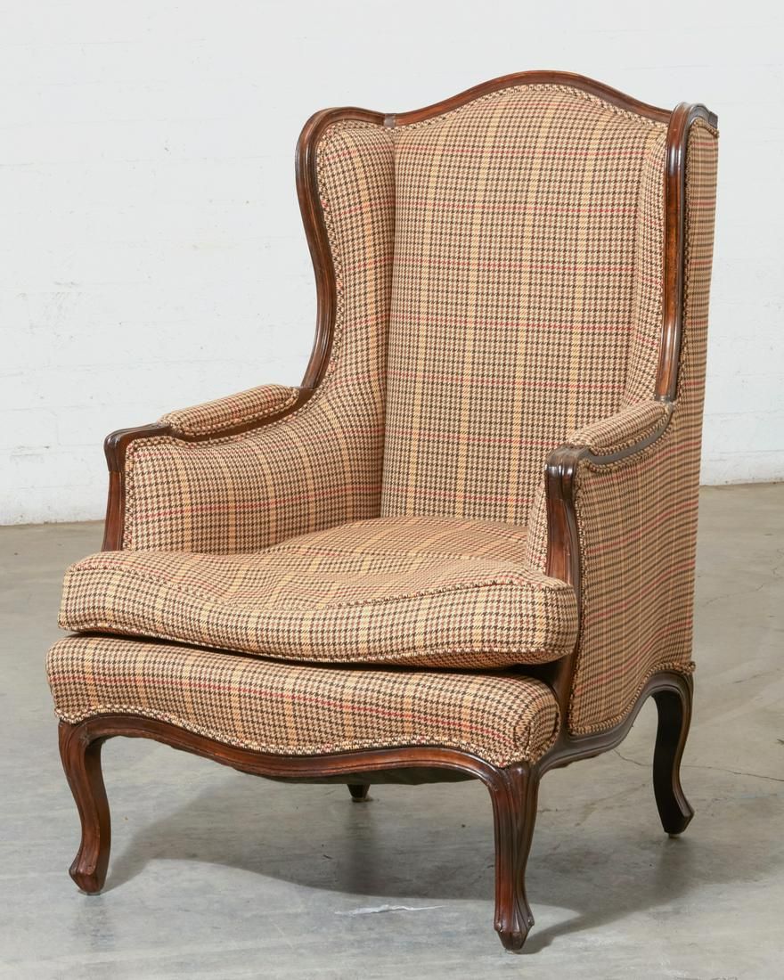 A LOUIS XV STYLE WINGBACK ARMCHAIRA