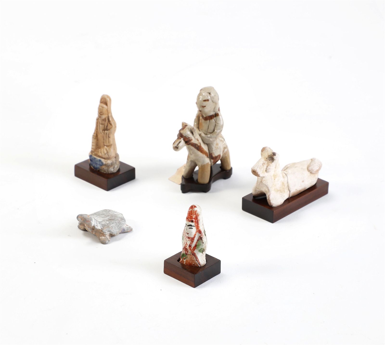 A GROUP OF ASIAN CERAMIC FIGURESA