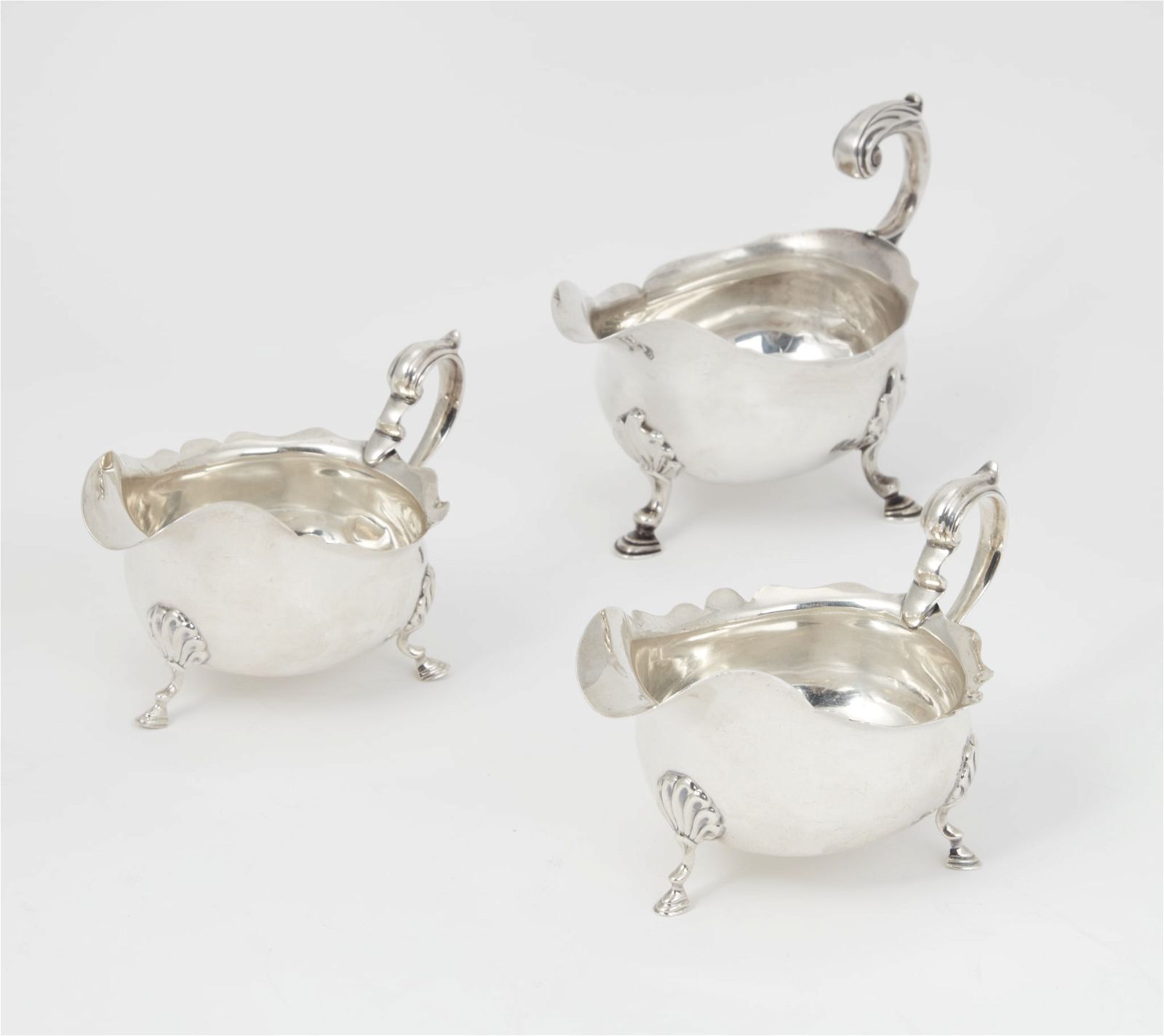 THREE ENGLISH STERLING SILVER SAUCE