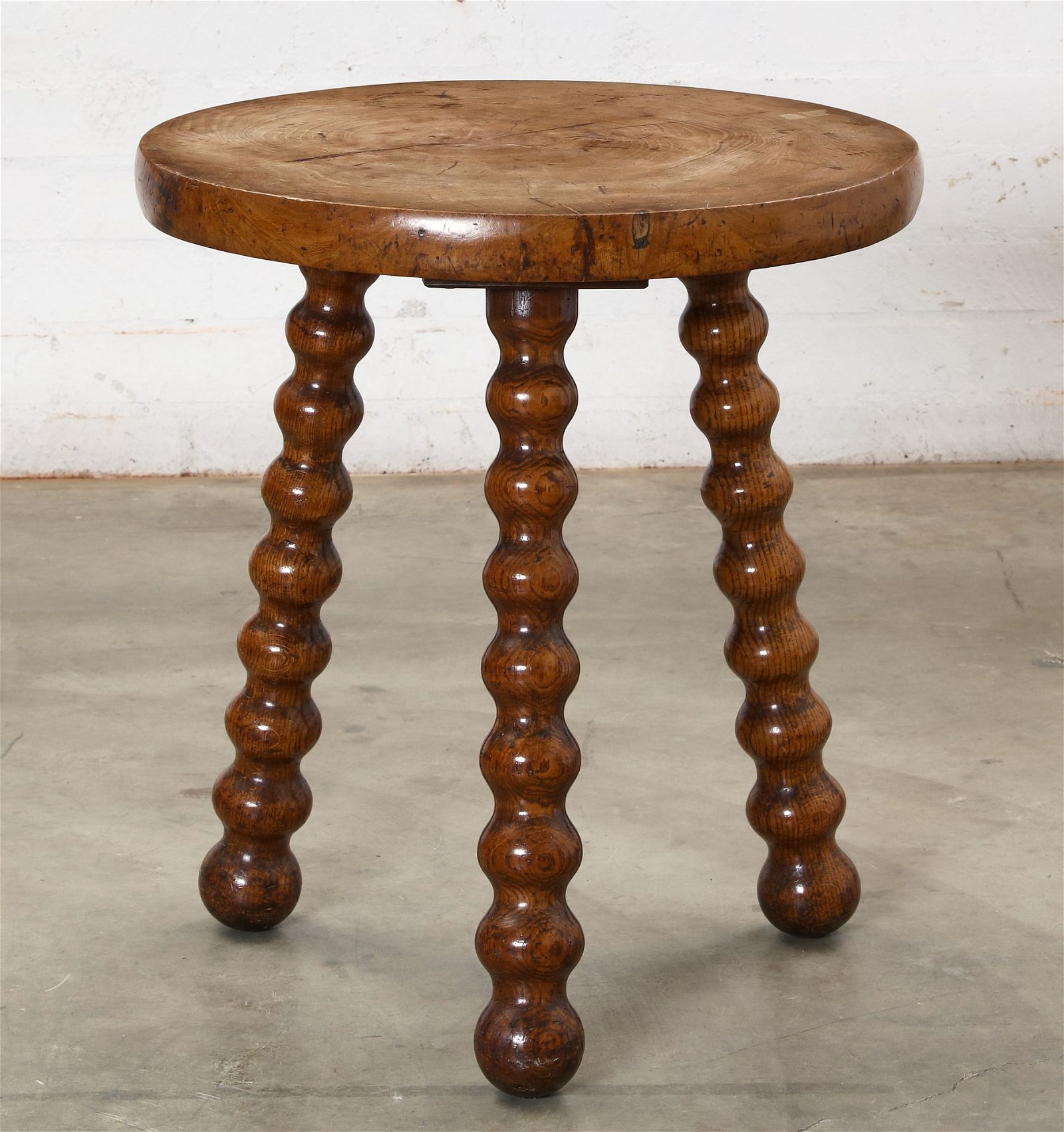 AN ENGLISH OAK AND WALNUT TABLEAn