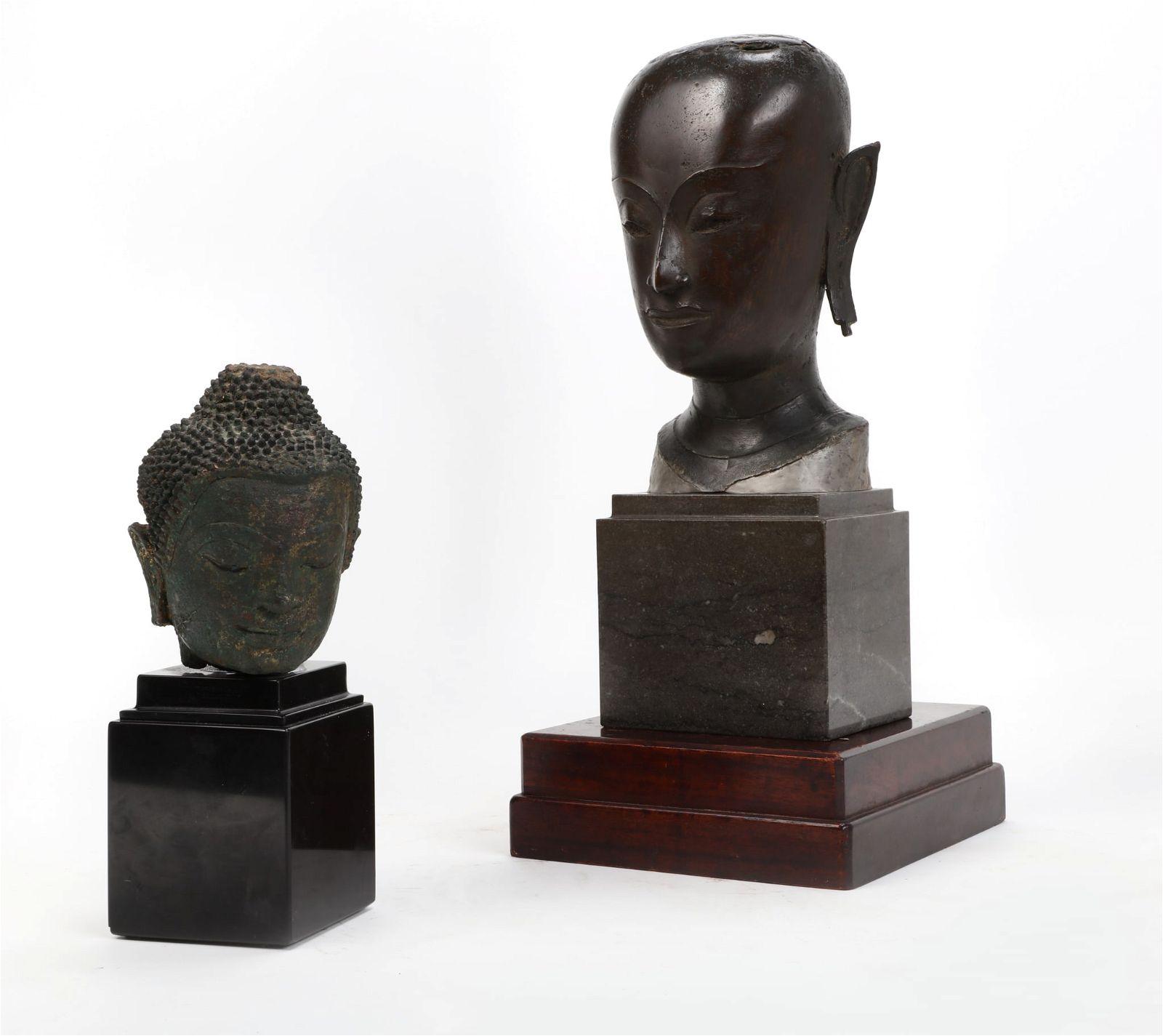 TWO ASIAN BRONZE HEADS OF BUDDHATwo