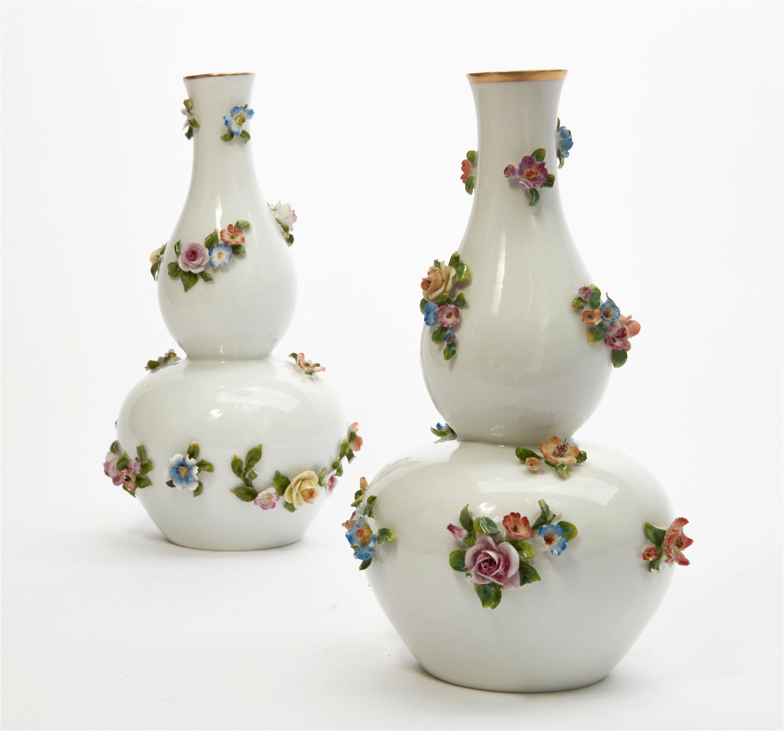 A PAIR OF GERMAN (VOLKSTEDT) PORCELAIN