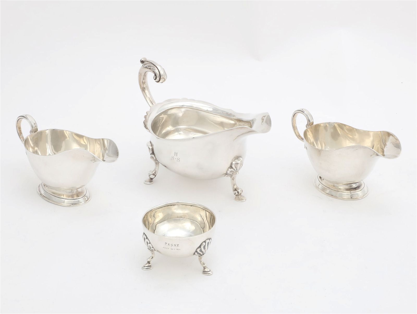 FOUR ENGLISH STERLING SILVER CONDIMENTWARESFour