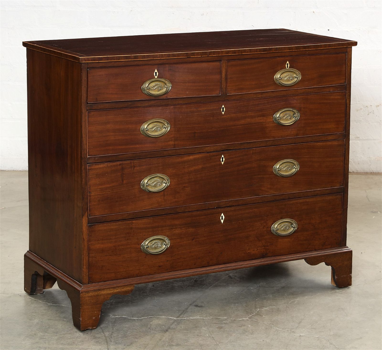 A GEORGE III MAHOGANY CHEST OF