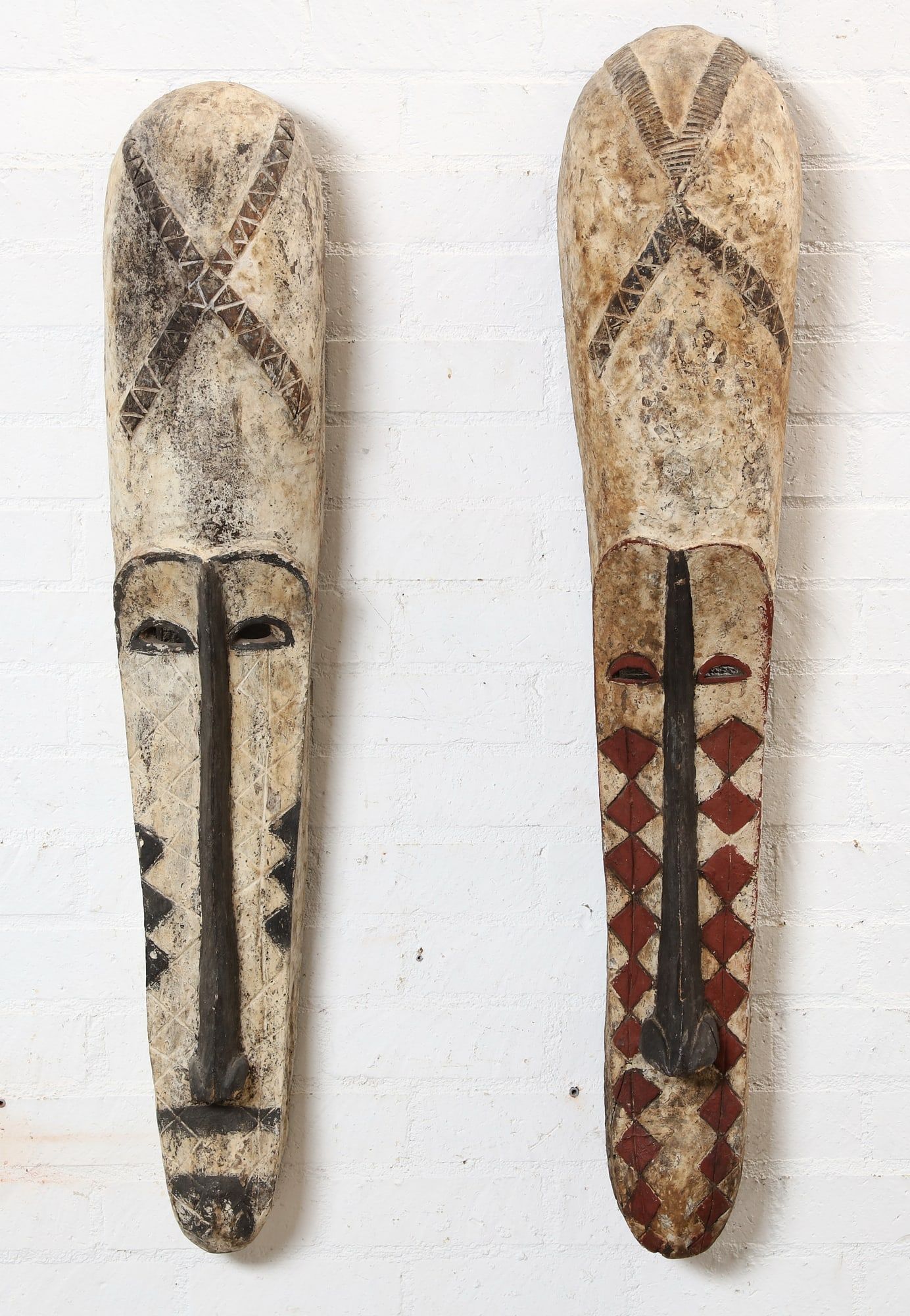 TWO AFRICAN TRIBAL ELONGATED MASKSTwo