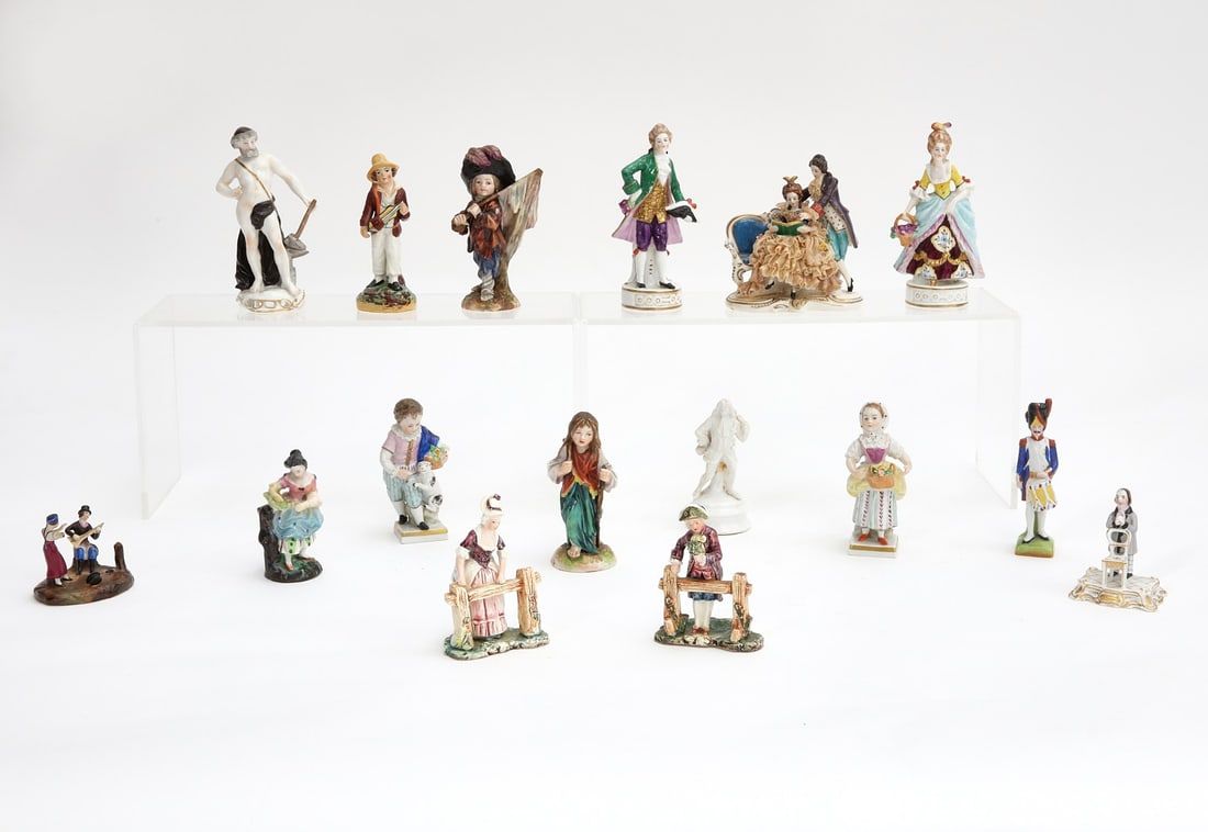 SIXTEEN CONTINENTAL PORCELAIN FIGURESSixteen