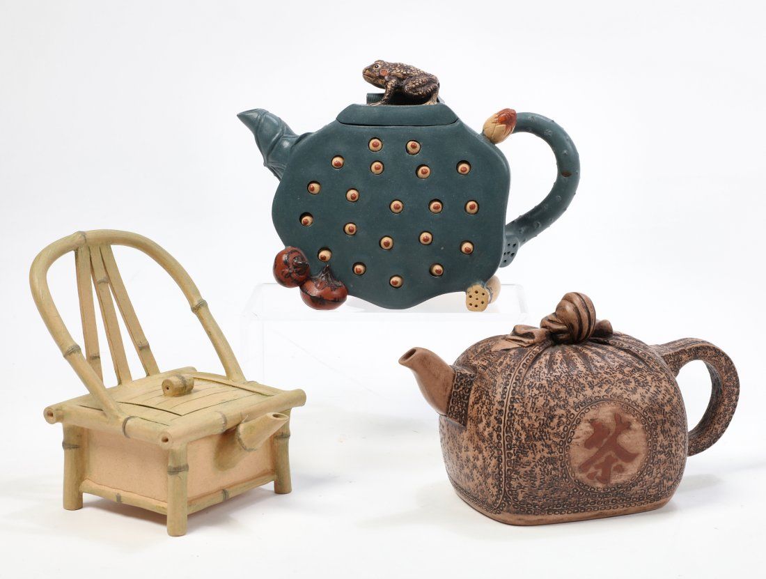 THREE CHINESE YIXING POTTERY TEAPOTSThree