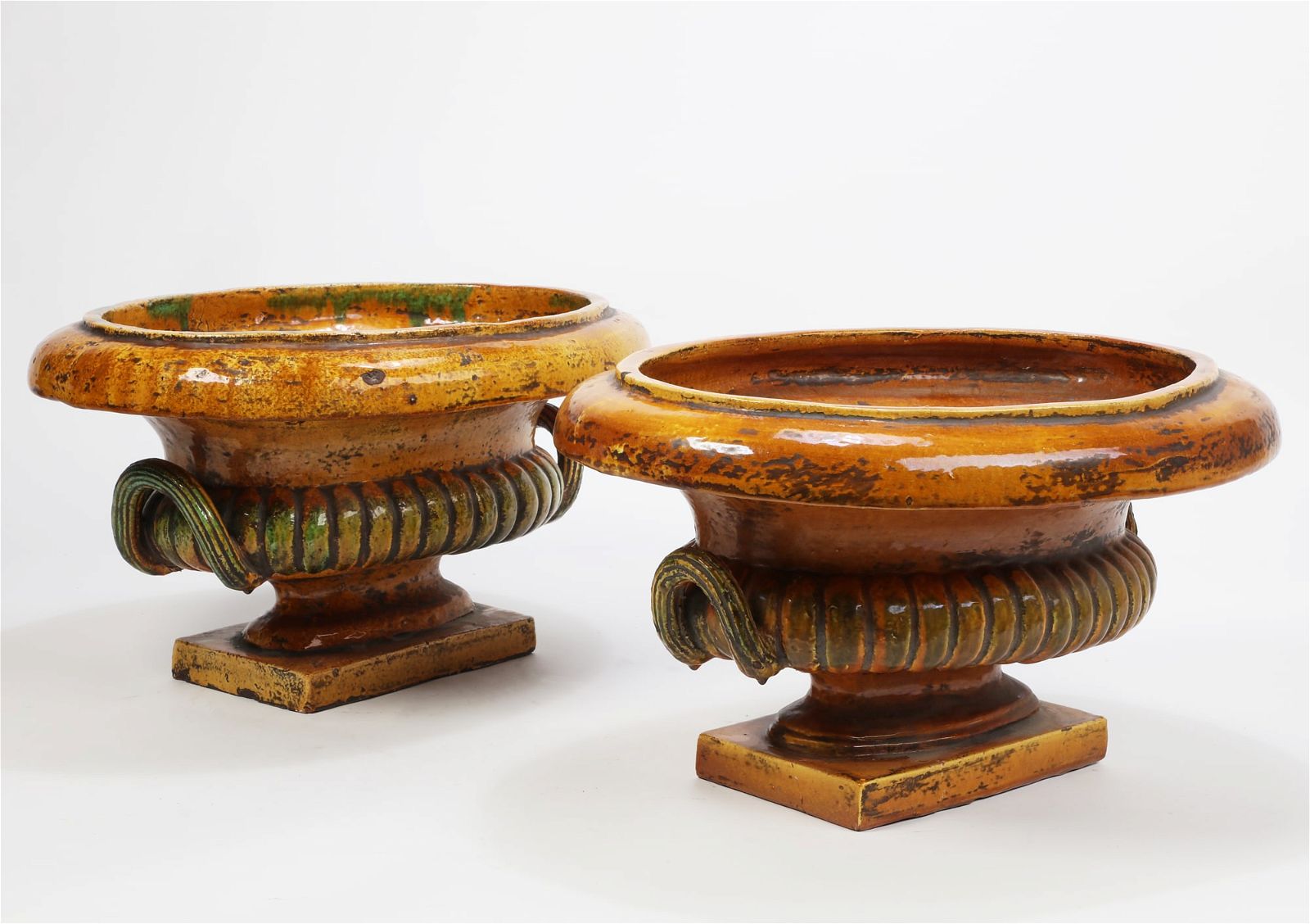 A PAIR OF CONTINENTAL GLAZED MAJOLICA