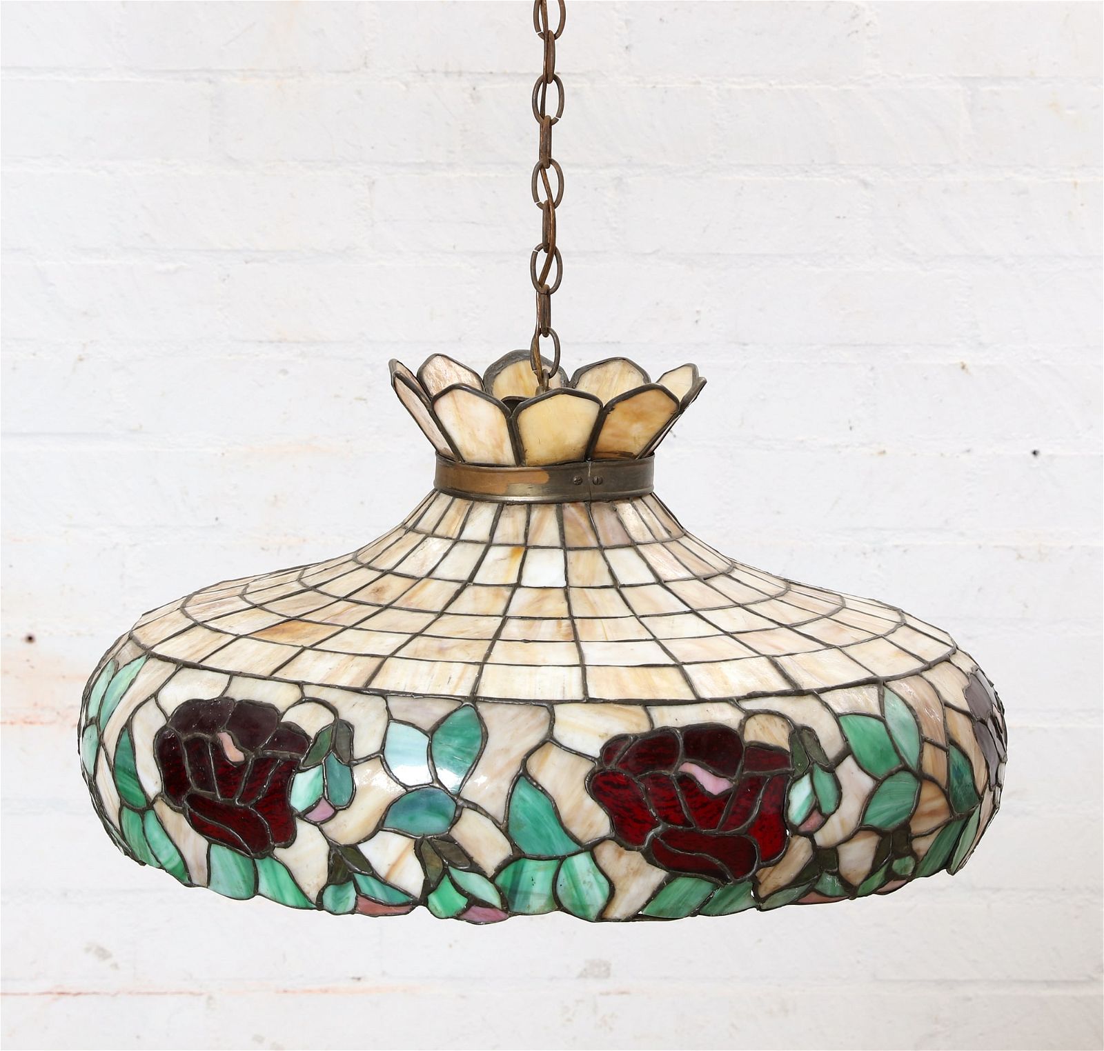 A LEADED SLAG GLASS FLORAL BAND HANGING