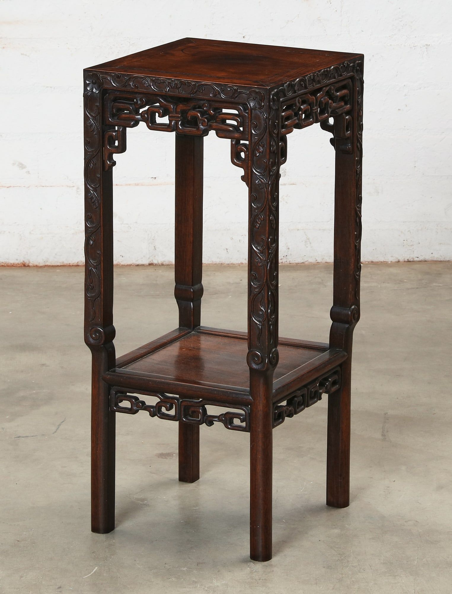 A CHINESE CARVED HARDWOOD PLANT