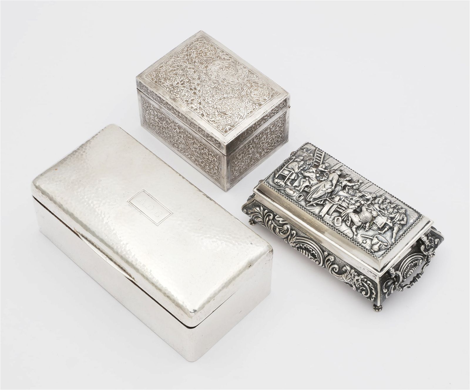 THREE INTERNATIONAL SILVER TABLE