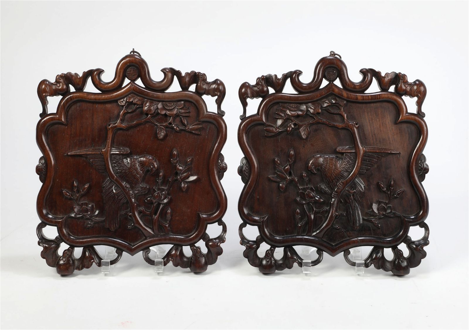 A PAIR OF ASIAN CARVED HARDWOOD