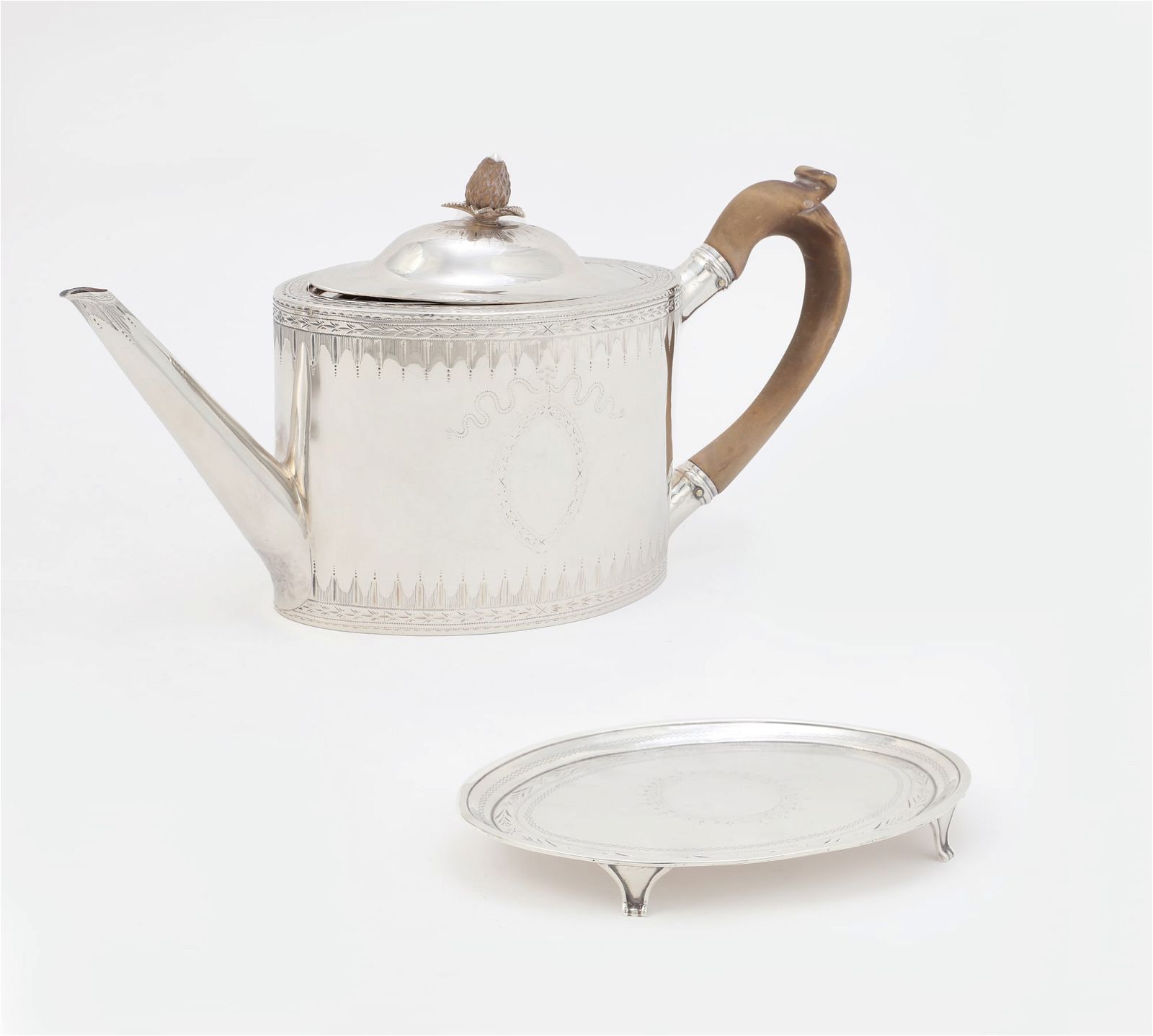 A GEORGE III STERLING SILVER TEAPOT
