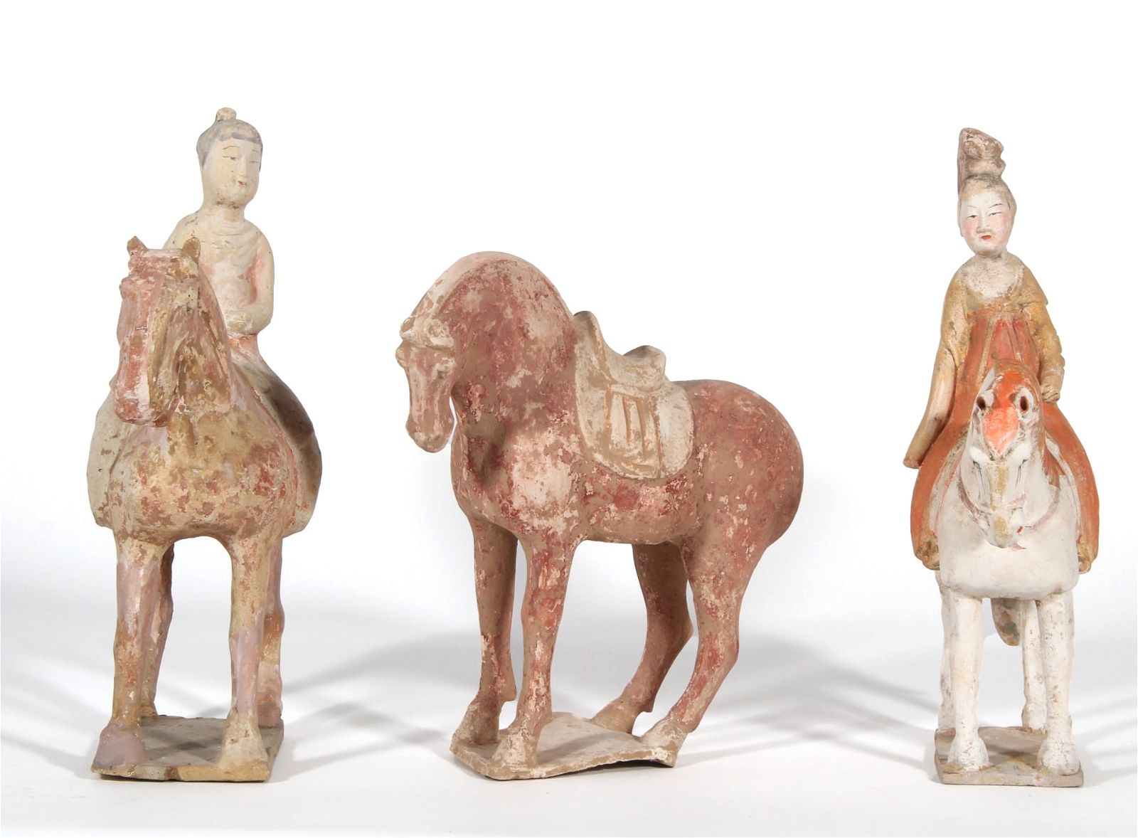THREE CHINESE POTTERY HORSES AND