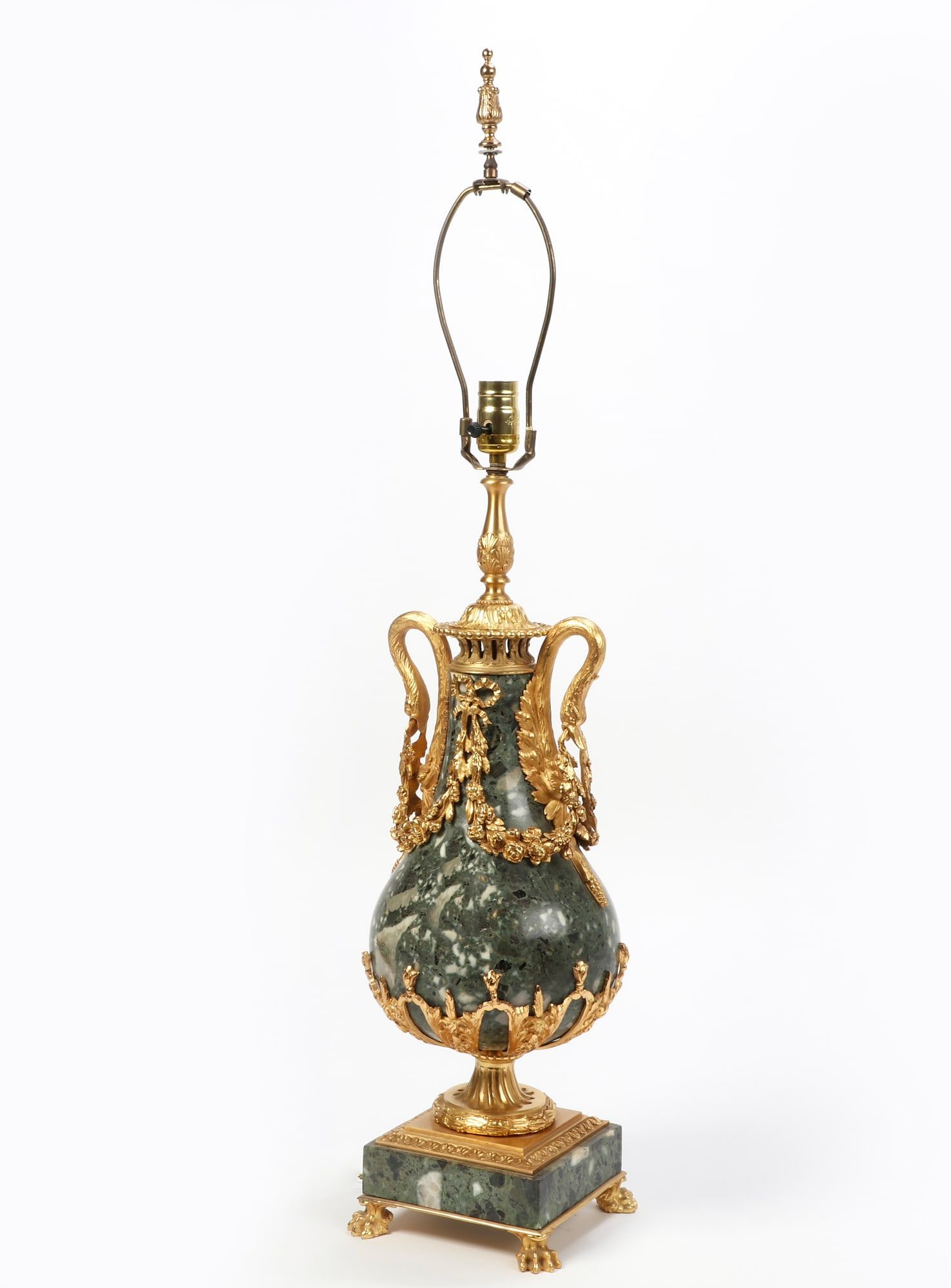 A LOUIS XVI STYLE GILT BRONZE MOUNTED